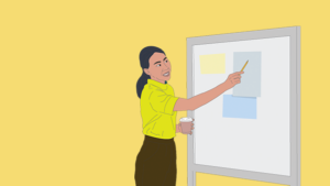 Woman pointing whiteboard